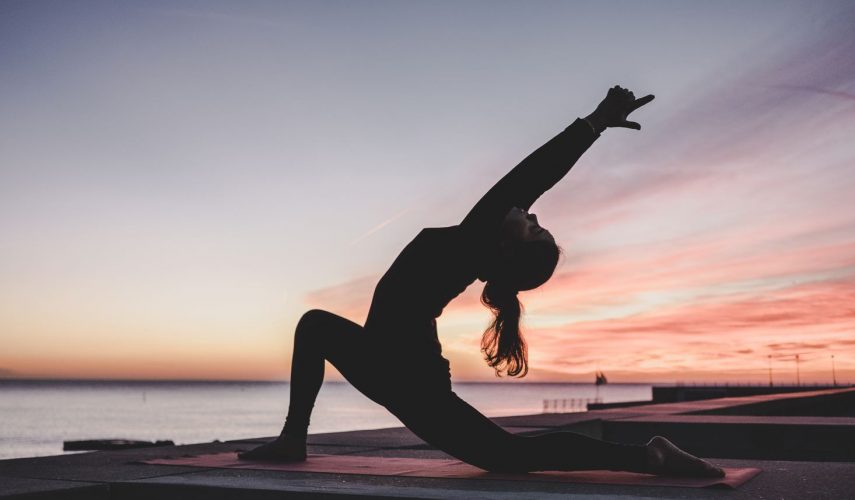 women stretching before taking part in exercise