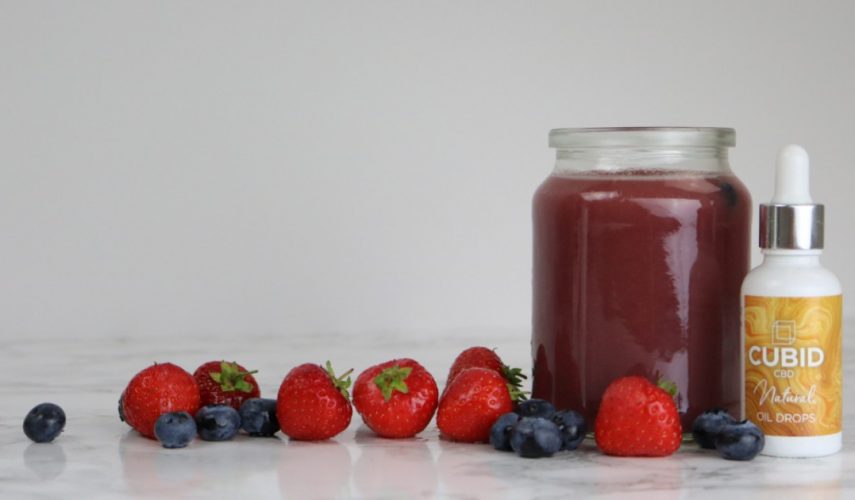 jar of CBD infused fruit smoothie with strawberries and blackberries
