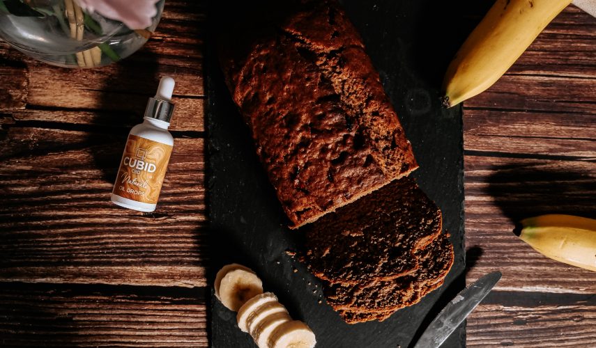 CBD vegan banana bread with CBD oil and a chopped banana.